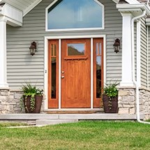 Front door with transparent stain and wood grain showing