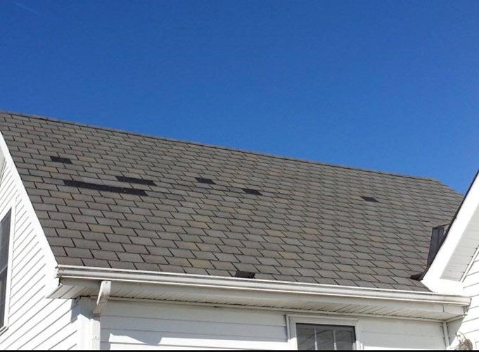 Damage from failed roof installation in Westerly, Rhode Island