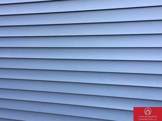 New vinyl siding installed by New England exterior remodelers