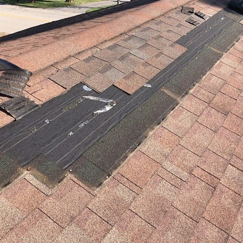 Roof damage being repaired in Westerly, Rhode Island